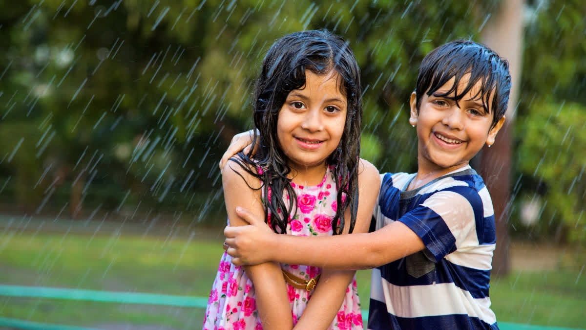 Kids playing in the rain
