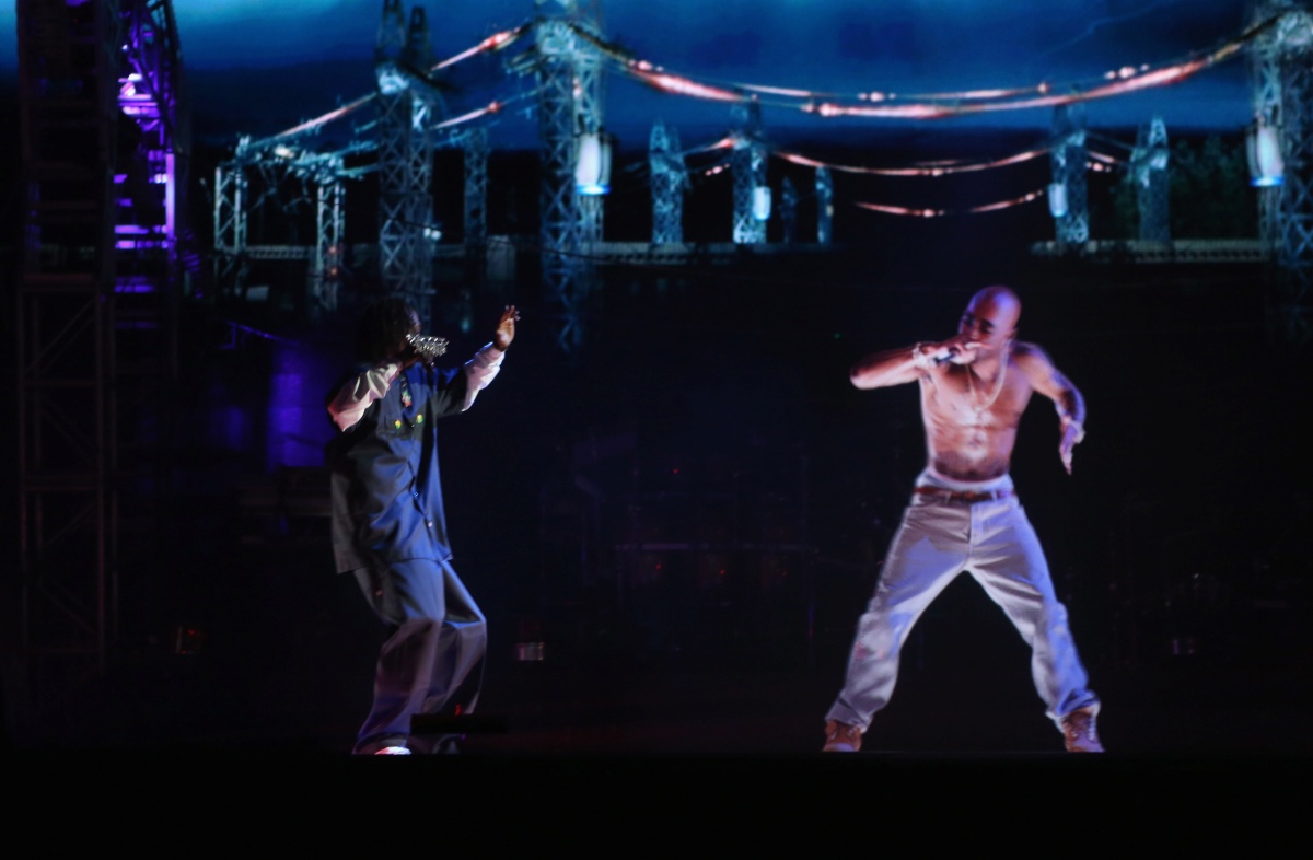Rapper Snoop Dogg and a hologram of deceased Tupac Shakur (right) performed onstage at the 2012 Coachella Festival