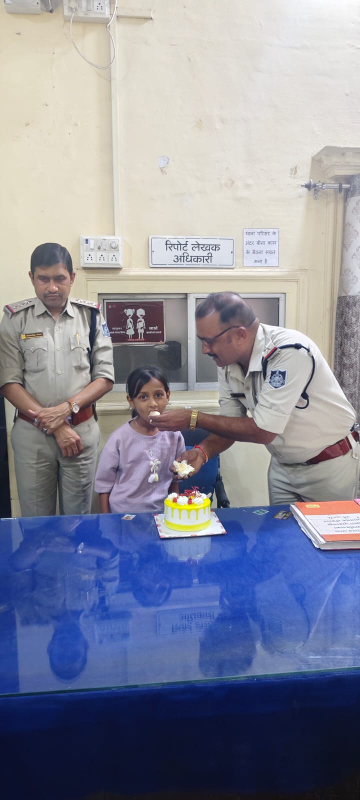 GIRL BDAY CELEBRATED POLICE STATION