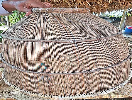 Women Making Household Items From Coconut And Palm Leaves