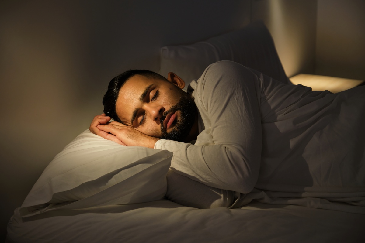 Man sleeping in bed