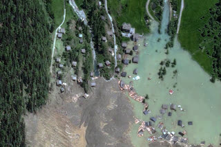 This handout satellite image courtesy of Maxar Technologies created on May 29, 2025, shows the small village of Blatten and its surroundings in the Bietschhorn mountain of the Swiss Alps, Switzerland on May 29, 2025 after it was destroyed the previous day by a landslide after part of the huge Birch Glacier collapsed and swallowed up by the river Lonza.