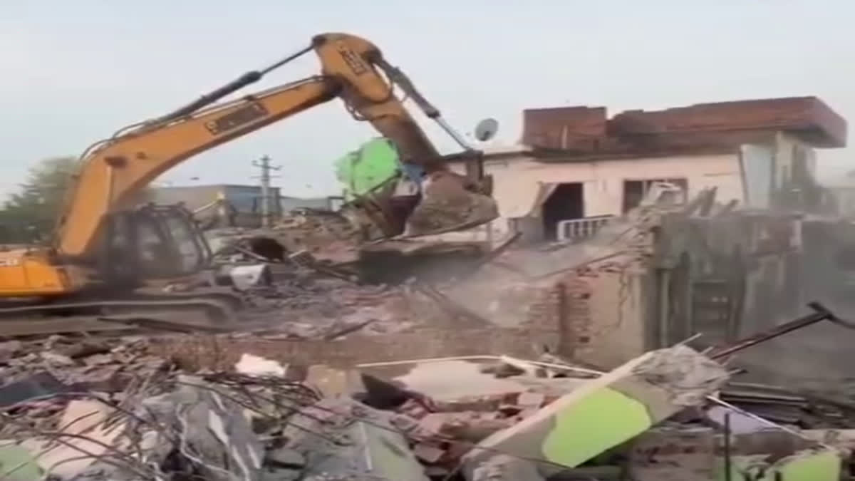 bulldozer action in faridabad