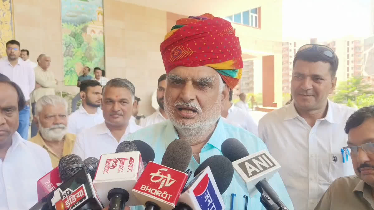 Minister Kharra interacting with the media