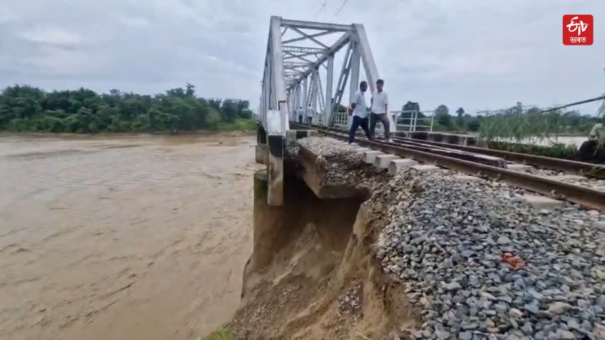 Dikhari river erosion carries threat to a railway bridge in Jonai