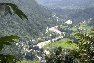 An aerial view of the swollen river after recent flash floods in Nepal