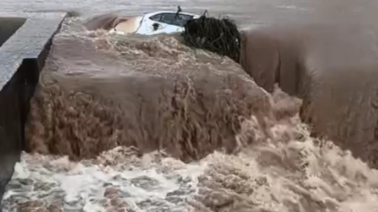 MCB district car swept away