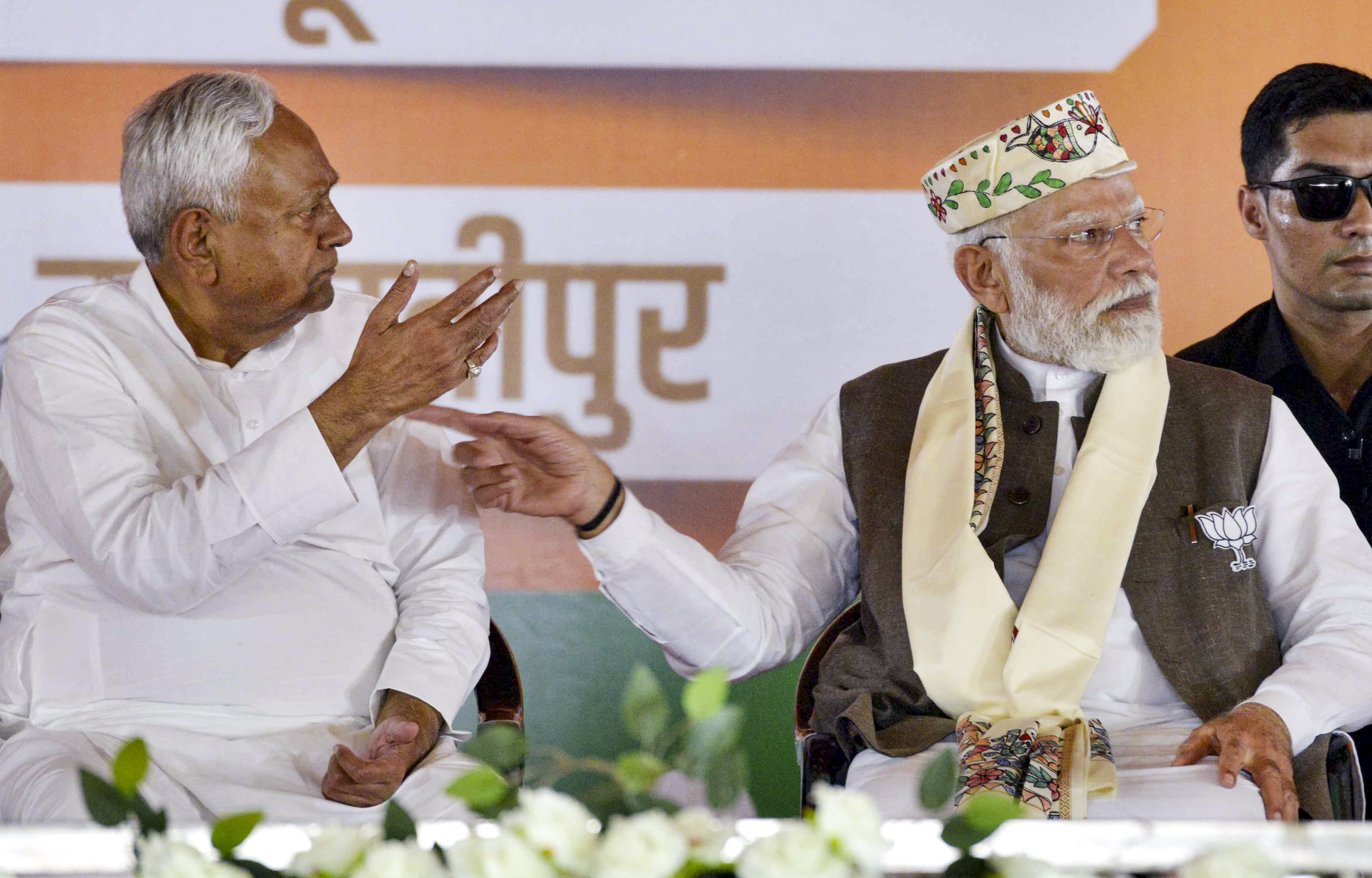 Prime Minister Narendra Modi, right, and Bihar Chief Minister Nitish Kumar during a public meeting ahead of the state Assembly elections, in Samastipur district, Friday, Oct. 24, 2025.