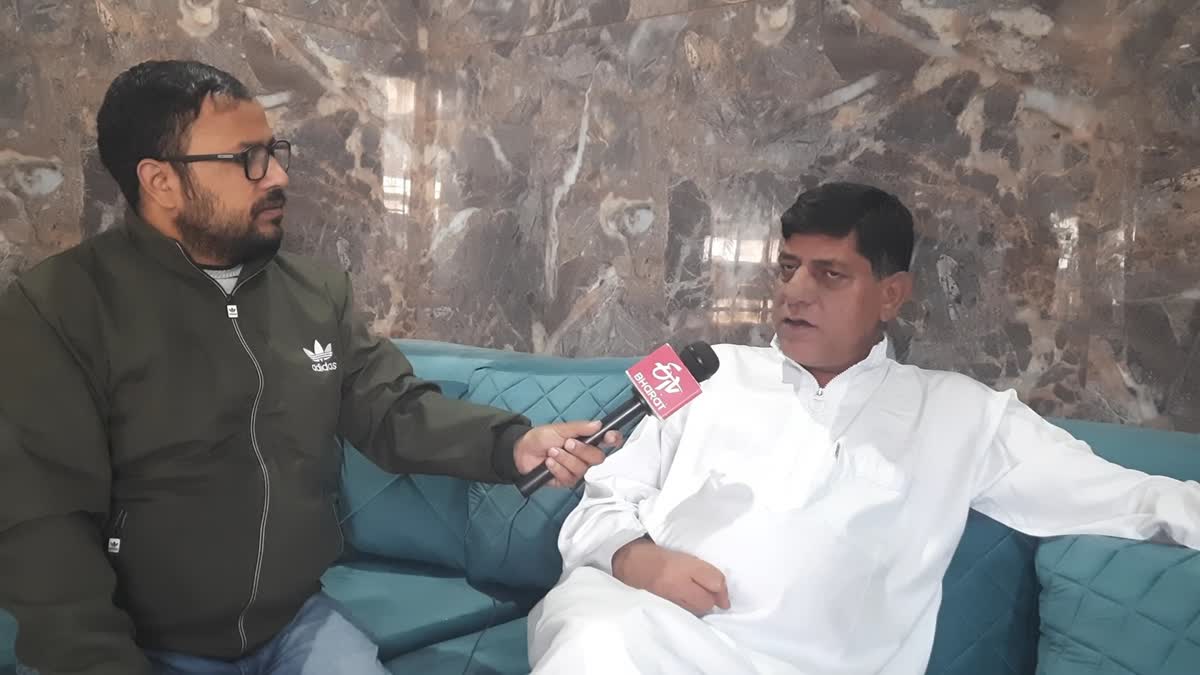 PDP General Secretary Imtiyaz Shan(R) in conversation with ETV Bharat correspondent Mohd Ashraf Ganie