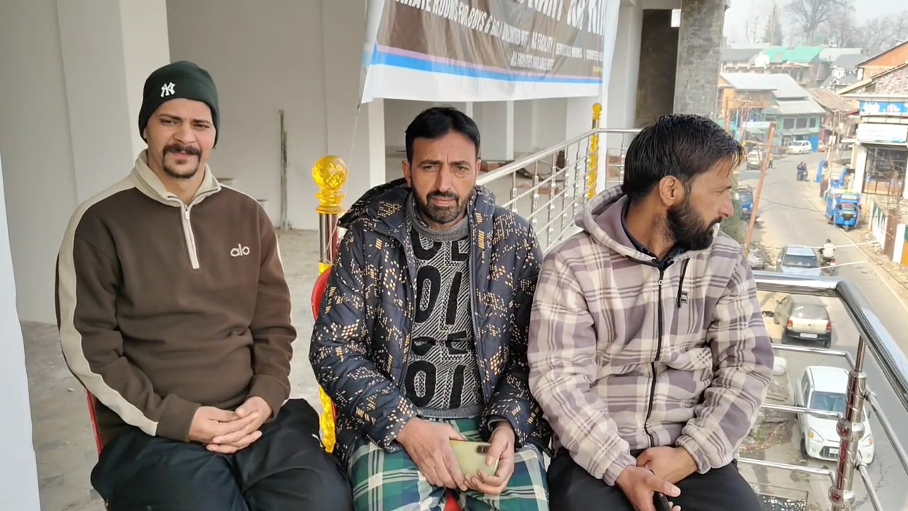 Kashmir businessman Mohammad Iqbal Shah(C) with friends