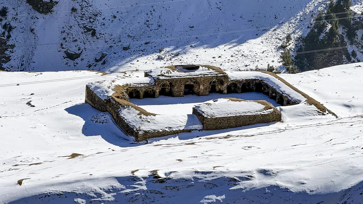 A view of snow-clad Mughal road in Jammu and Kashmir