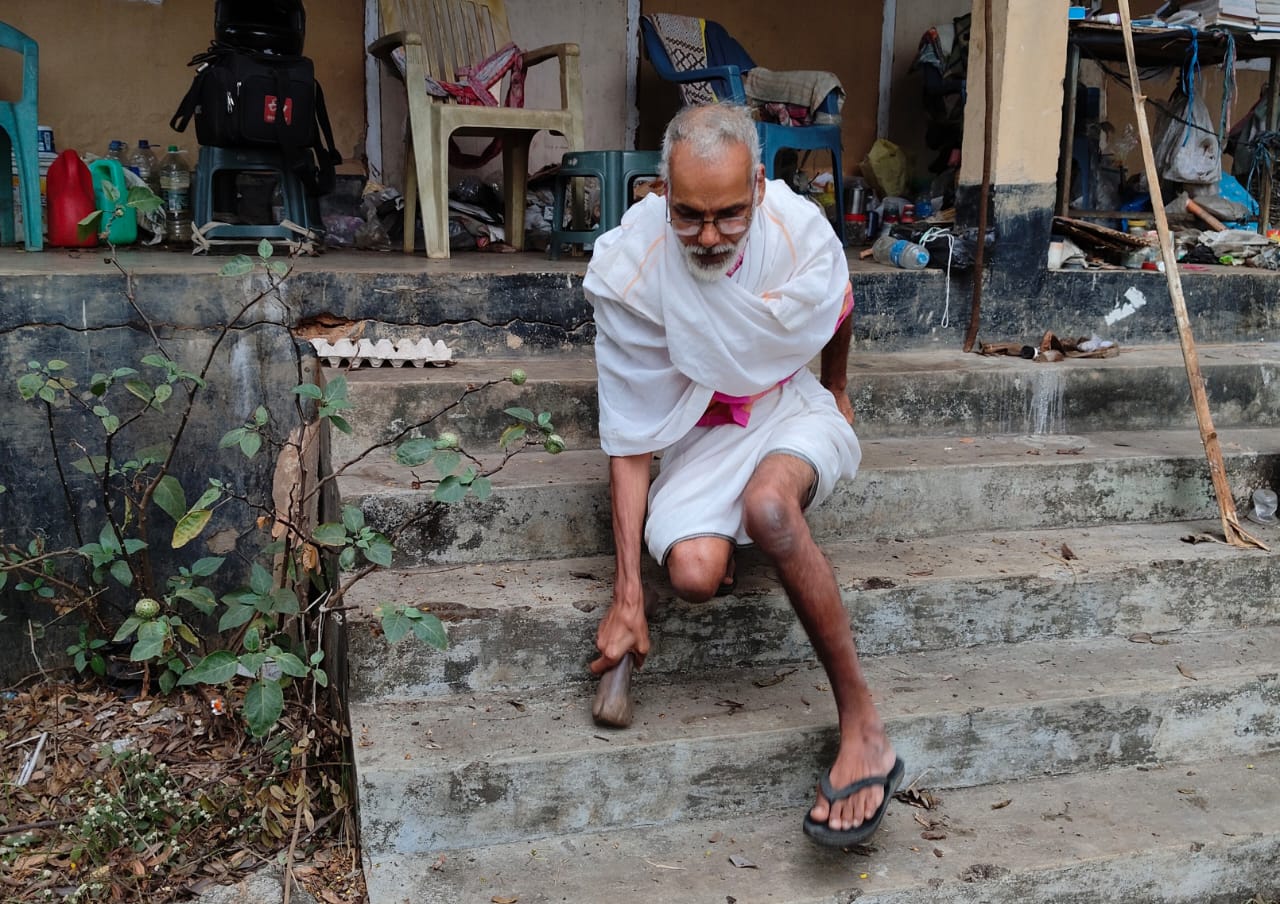 Sanskrit scholar who is engaged in unremitting pursuit of knowledge despite his physical disability