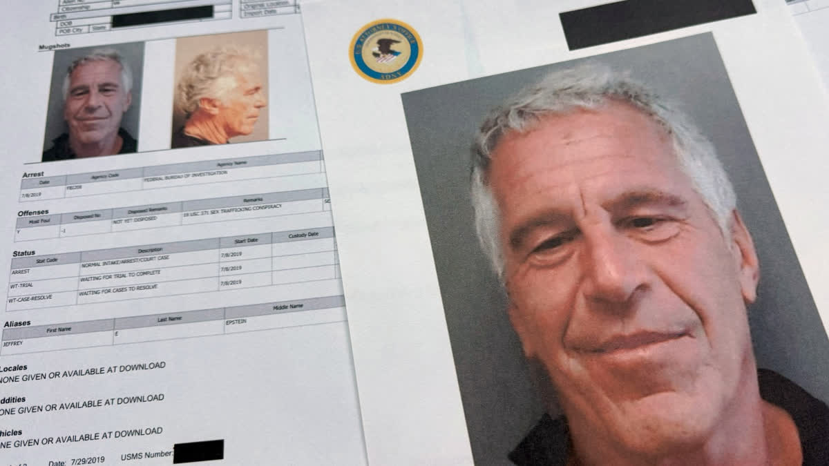 FILE - Documents that were included in the U.S. Department of Justice release of the Jeffrey Epstein files are photographed Friday, Jan. 2, 2026.