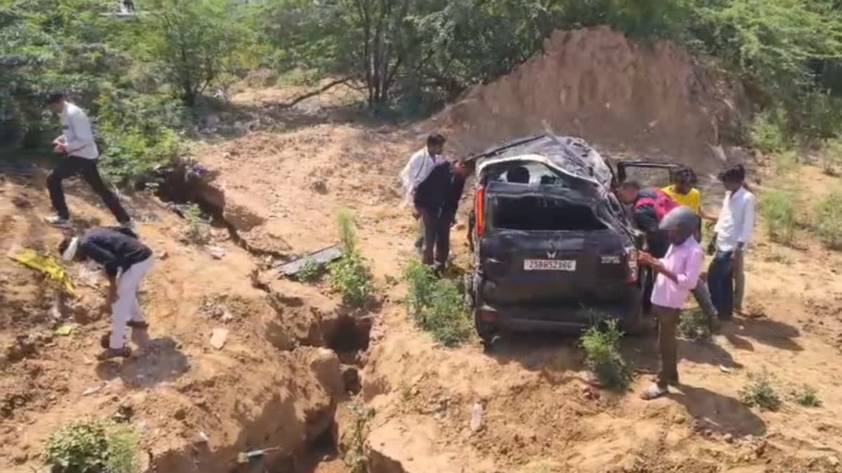 Damaged SUV plunges off road into field