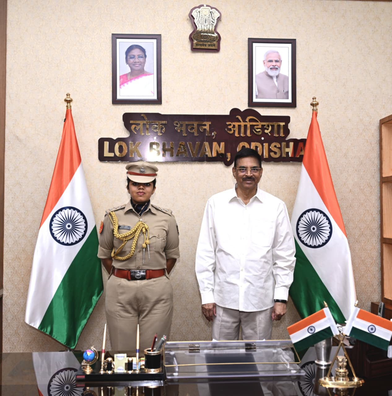 IPS Officer Ananya Awasthi with  Odisha Governor Dr Hari Babu Kambhampati