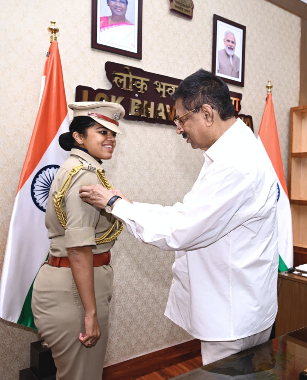 IPS Officer Ananya Awasthi with  Odisha Governor Dr Hari Babu Kambhampati