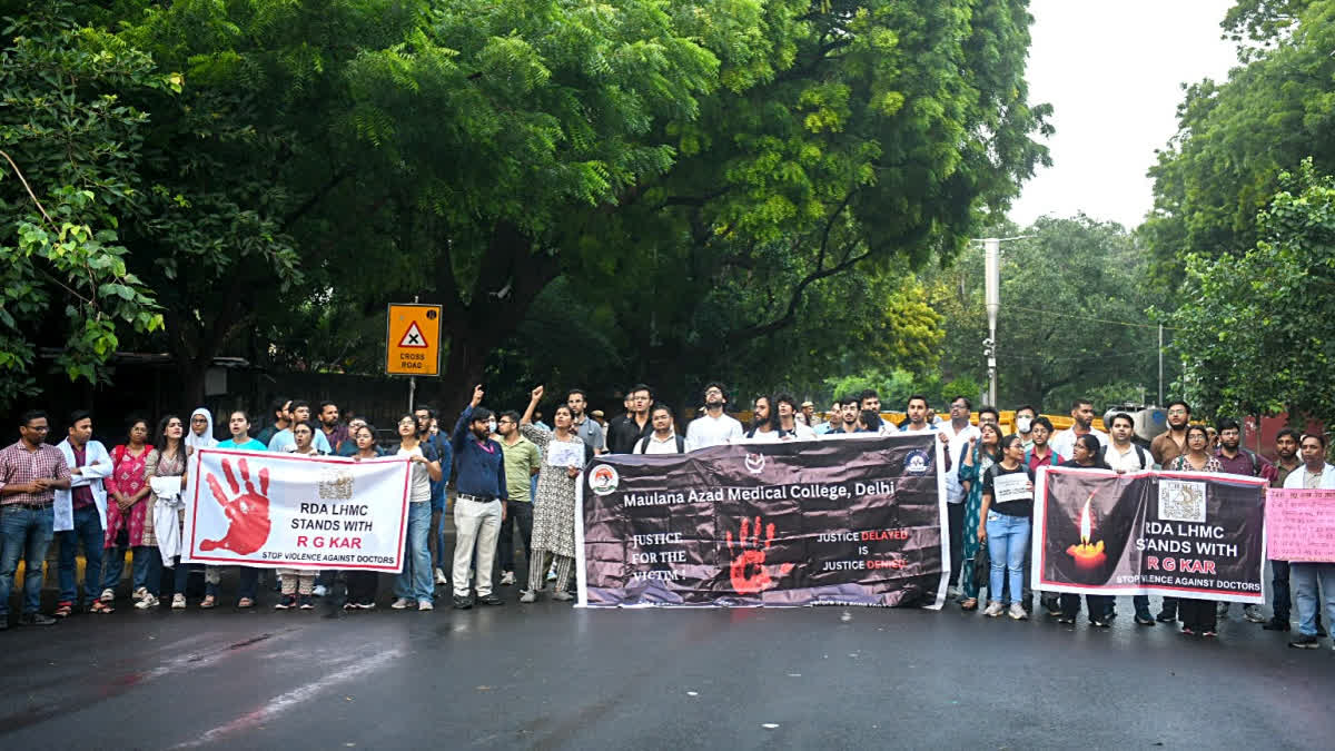 Kolkata Rape-murder Case: Doctors To Protest At Jantar Mantar Today Doctors raise slogans as they stage a protest demanding justice against the alleged sexual assault and murder of a postgraduate trainee doctor of the Kolkata RG Kar Hospital, at Jantar Mantar in New Delhi on Friday.