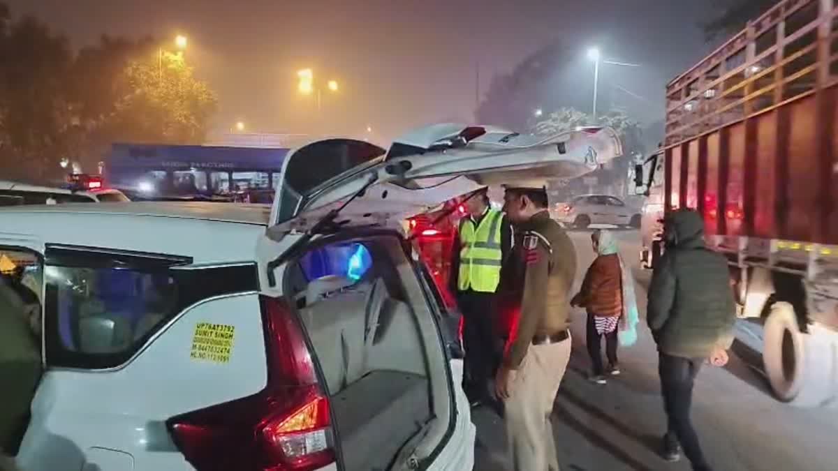Police personnel conduct vehicle checks during heightened security arrangements ahead of New Year’s Eve celebrations
