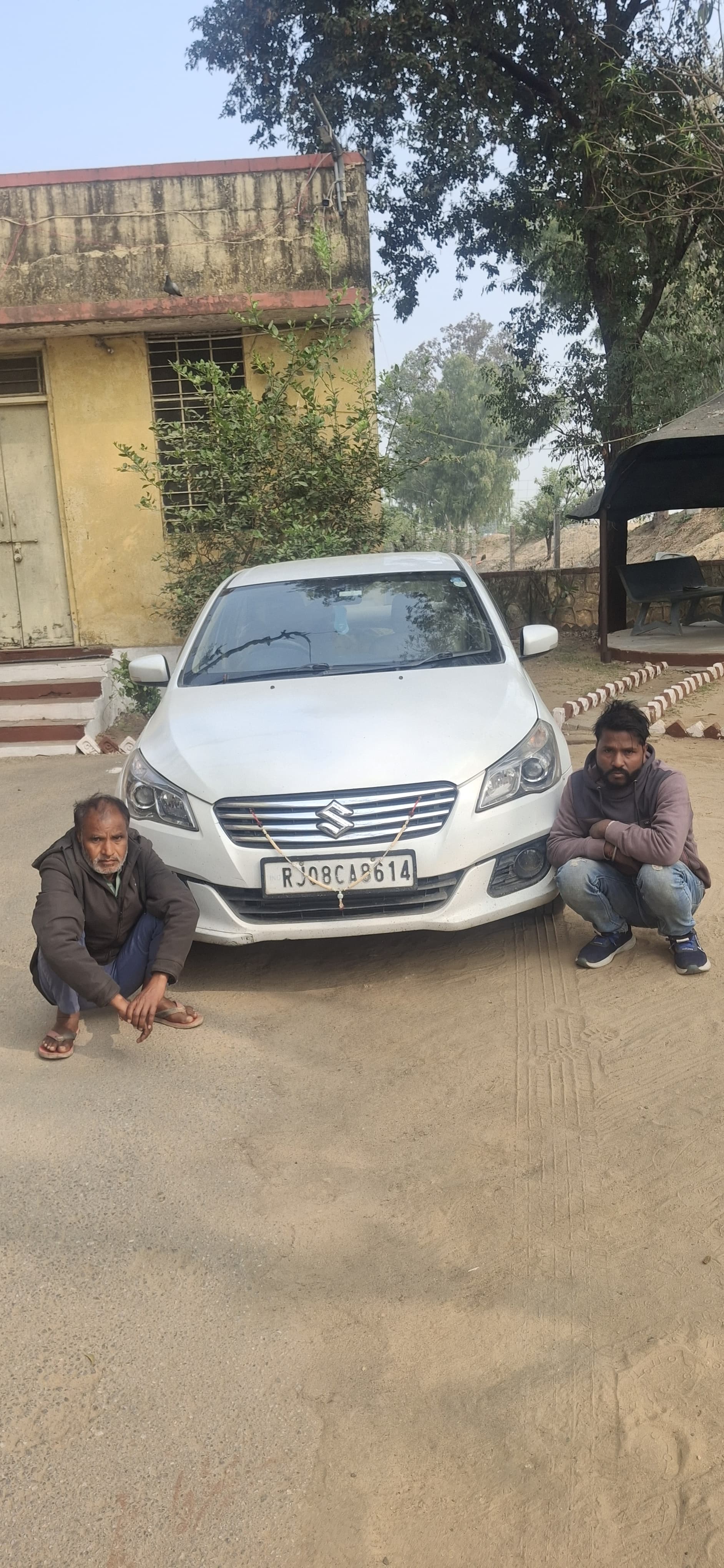 The accused and the car used for transporting the explosives.