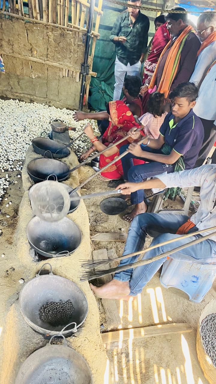 youth preparing makhana