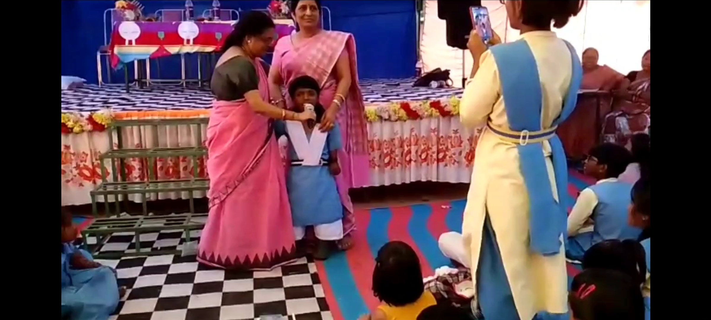 Payal Nag is performing music at school.