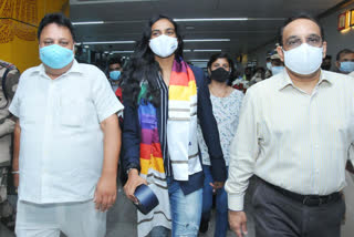 Tokyo Olympic Bronze Medallist PV Sindhu with BAI General secretary Mr Ajay Singhania (left) during her felicitation and welcome at IG stadium, Delhi on Tuesday 2.