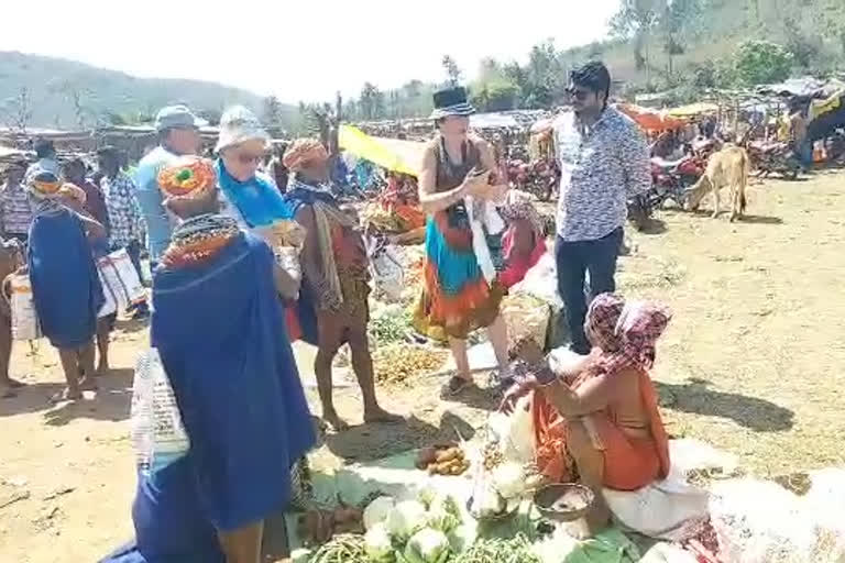 forigners in tribal market at vishakapatnam